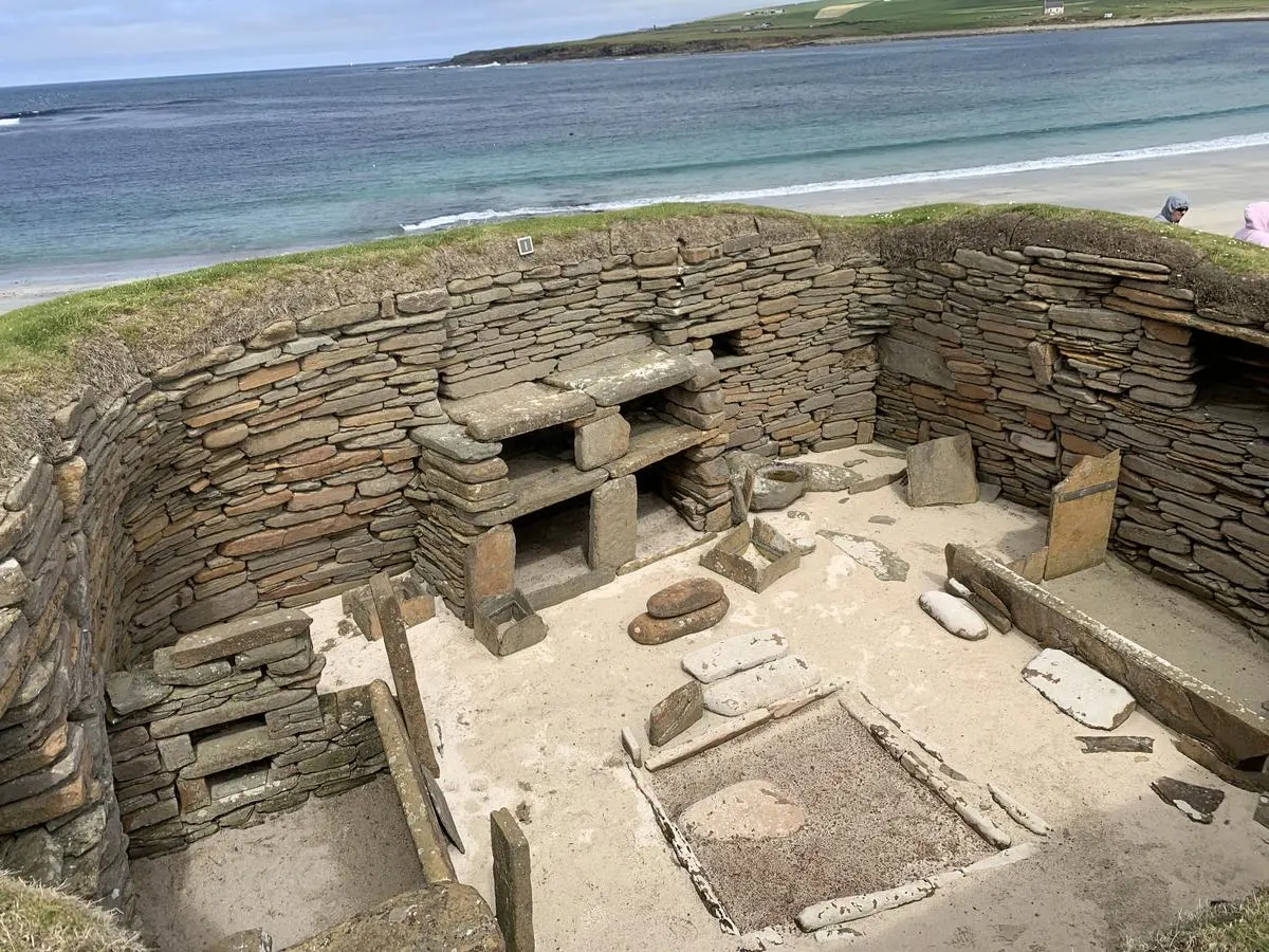 Skara Brae Neolithic site. In Souls of Scapa Flow, Alan Muir takes Helen Hughes here.
